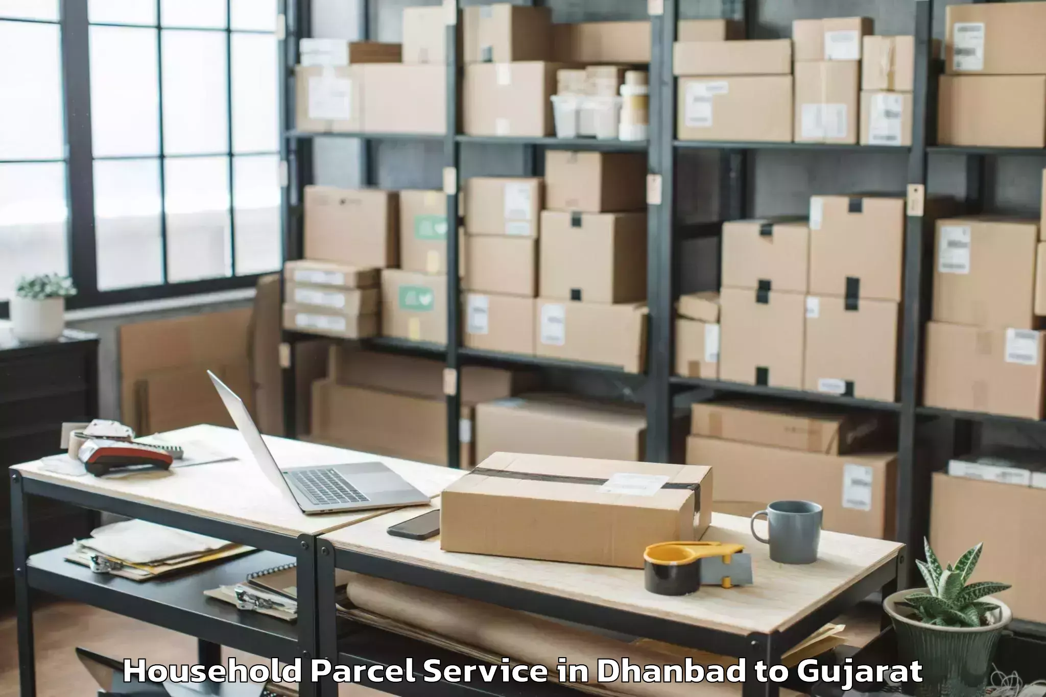 Easy Dhanbad to Porbandar Household Parcel Booking